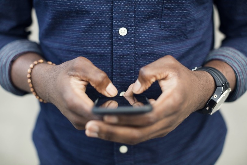 Man Texting on Cellphone